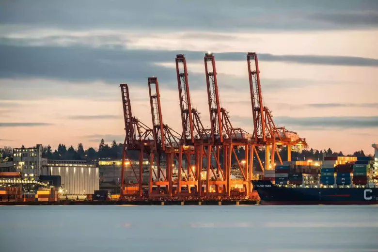 Image showing a dock with cranes in the background and the ocean